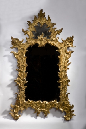 An Extravagant German Rocaille Giltwood Mirror